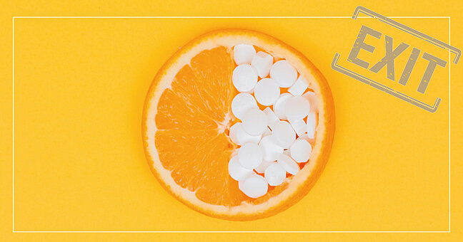 Orangenscheibe mit Tabletten